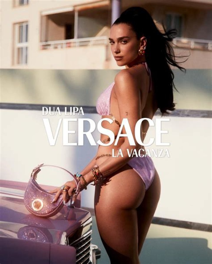 Dua Lipa models blinged-out pink bikini for Versace collaboration